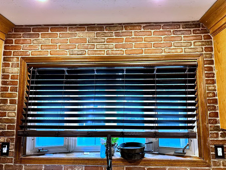 Brick returned into the window opening