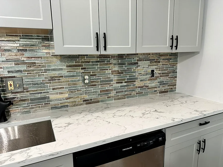 Glass mosaic backsplash, marble counter