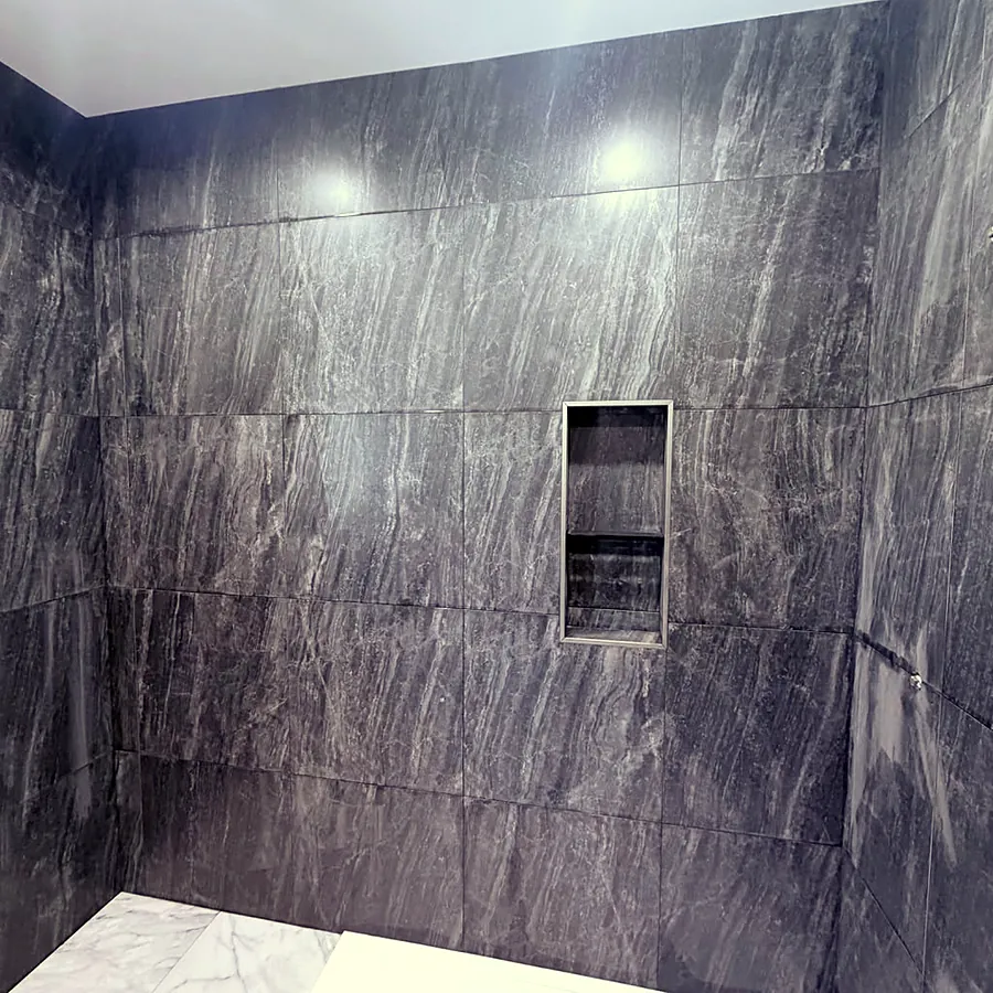 Book-matched wall panels with recessed niche